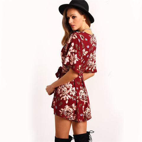 DEEP PLUNGE FLORAL ROMPER